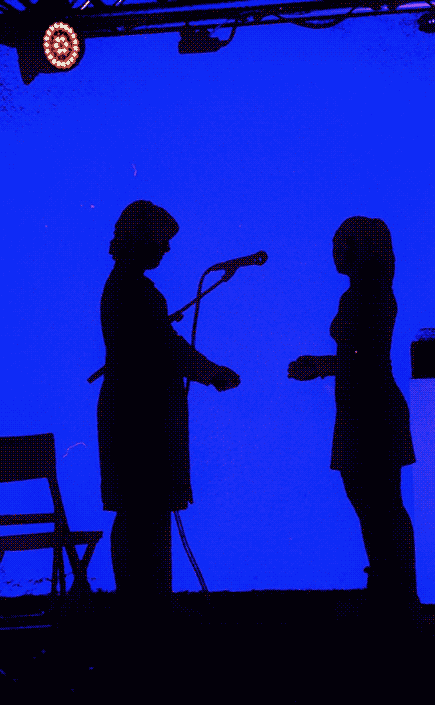 two human shadows are facing each other, the background is a deep blue.