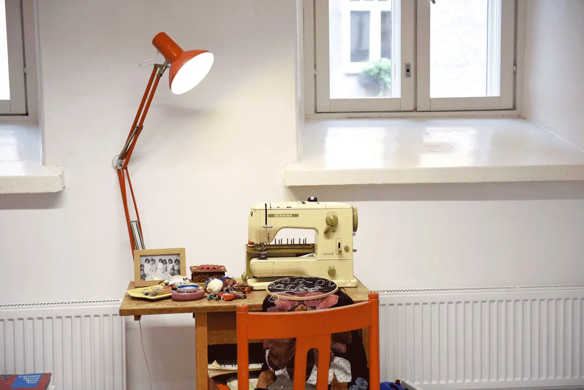 A close up of the mentioned sewing table.